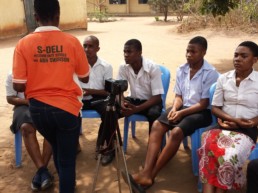 Mary a Sign Language Specialist collecting data